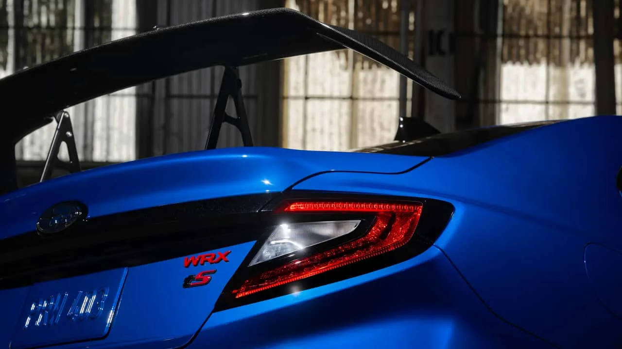 Teaser image of a Subaru WRX with a large rear wing ahead of its 2027 special-edition reveal