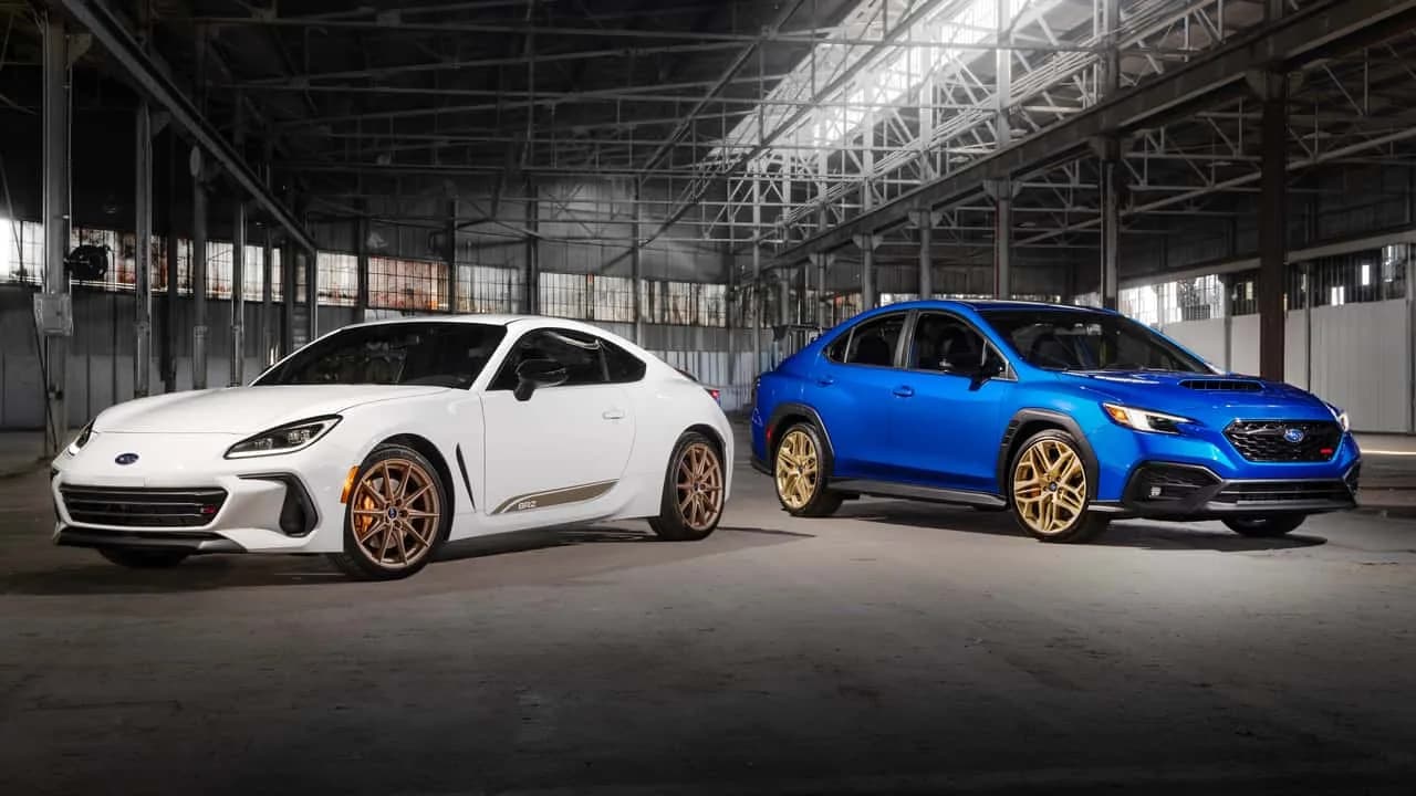 2027 Subaru WRX GD25 in World Rally Blue with gold wheels and a large rear wing