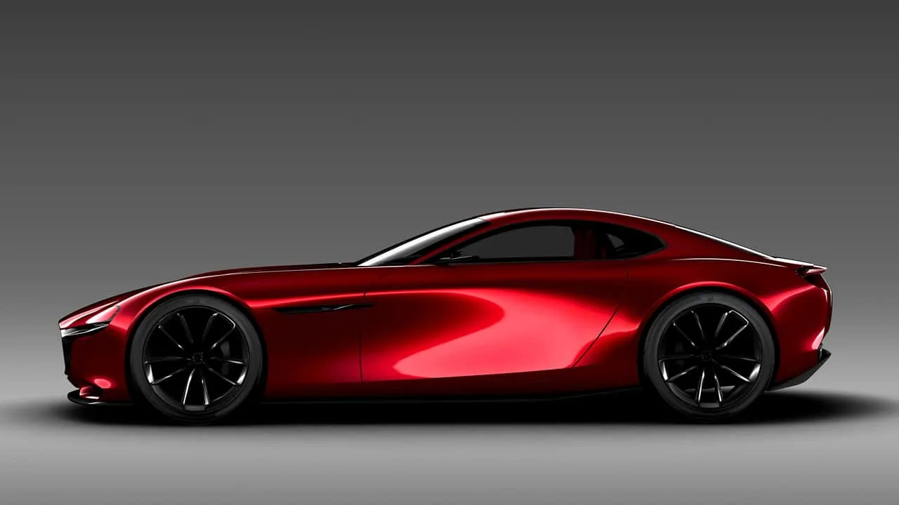 Deep ruby-red vehicle finish showing Axalta’s Redefined 2027 color under changing light