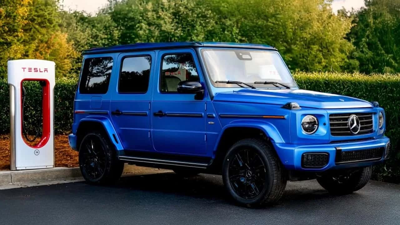 2027 Mercedes-Benz G 580 Electric charging at a Tesla Supercharger