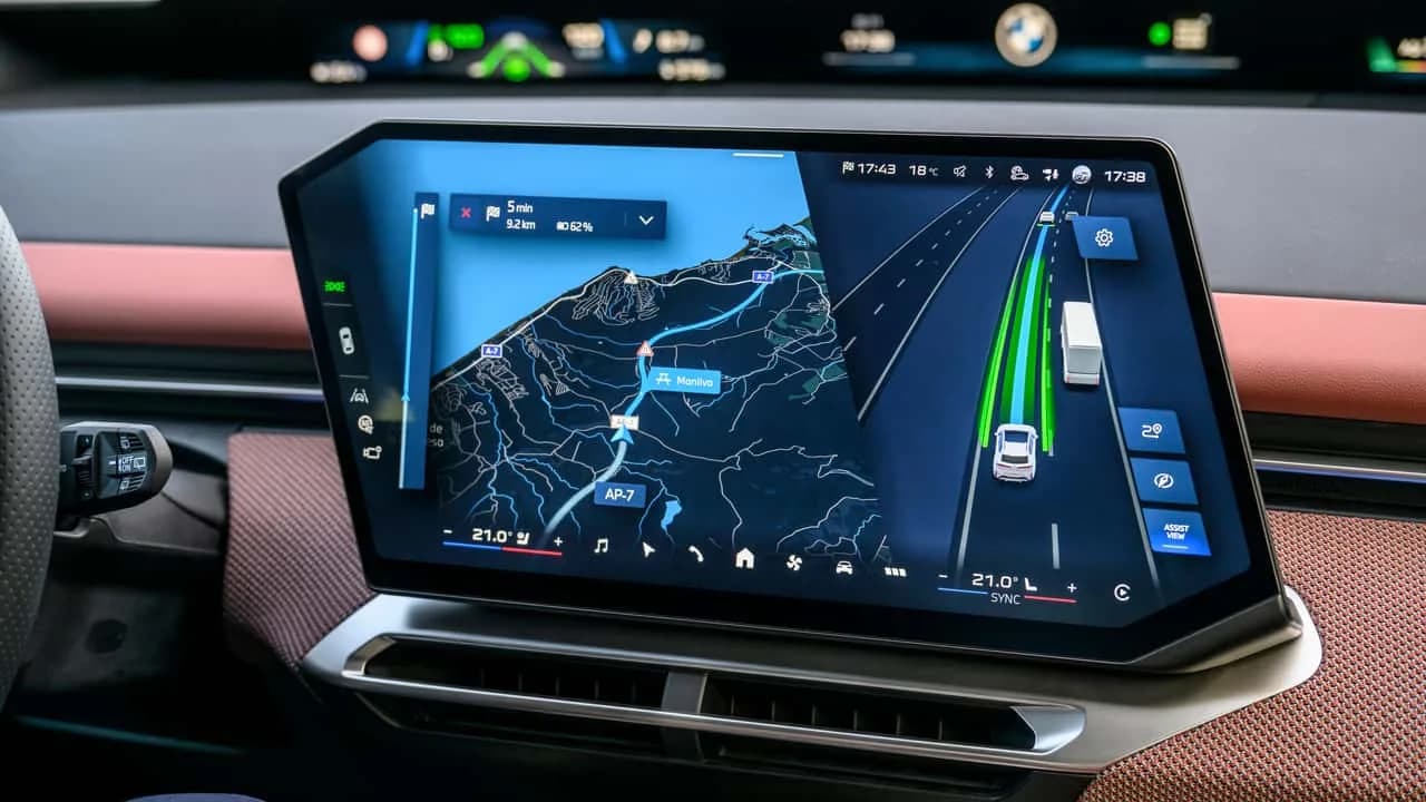 BMW iX3 driving on a road, representing the automaker's opt-in safety data program
